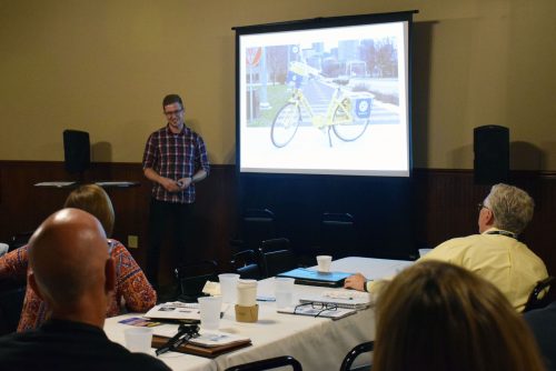 Warsaw native Dan Remington, who serves as the customer service manager for the Indianapolis Cultural Trail, attended the summit. He shared Indianapolis' success with their Cultural Trail and bike share program. (Photo by Maggie Kenworthy)
