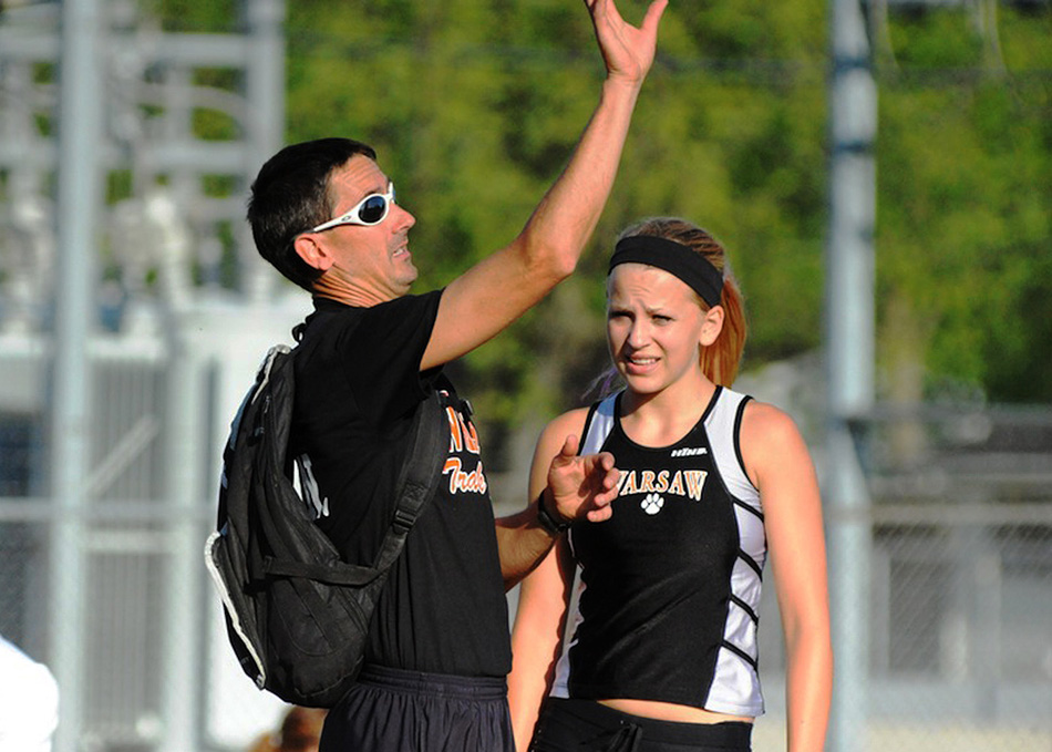 WCHS track coach Scott Erba and pole vault school record holder Claire Hickerson will host a pole vault camp this June. (File photo by Mike Deak)