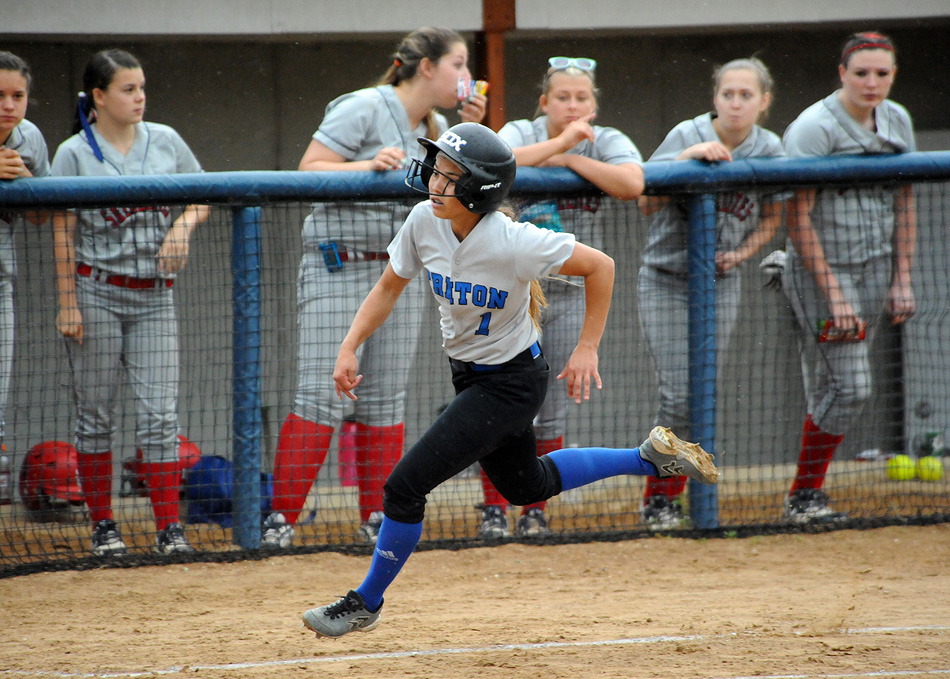 Triton's Taytum Hargrave motors around third to score her team's first run at the South Central Regional.