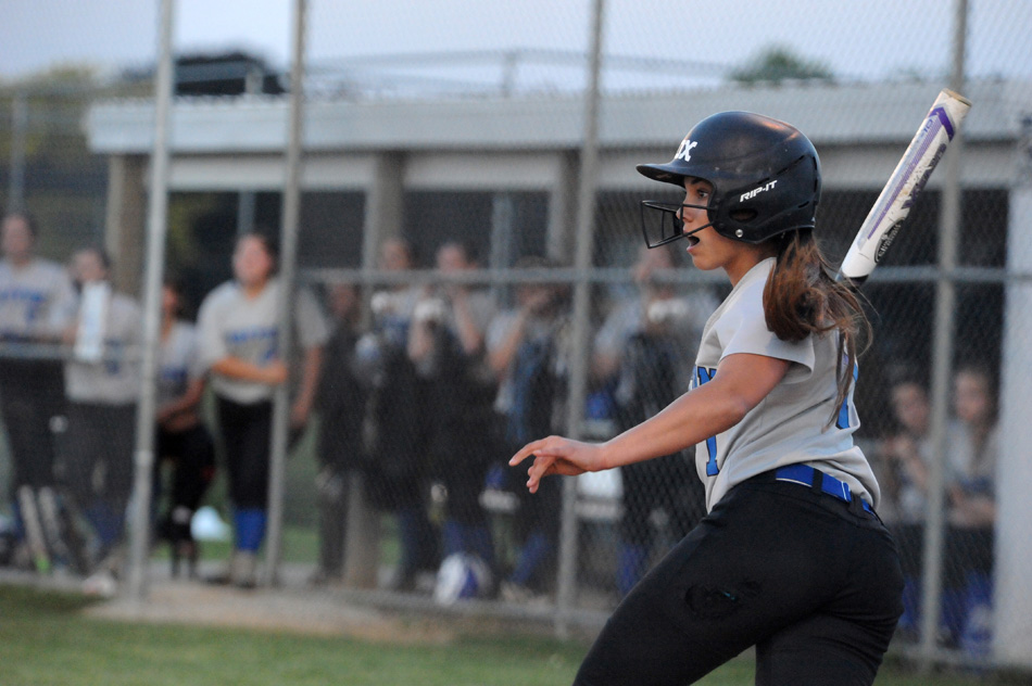 Triton's Taytum Hargrave watches her triple fly in the first inning of a 13-2 win over Lakewood Park Christian Monday night in the Triton Softball Sectional semi-finals. (Photos by Mike Deak)