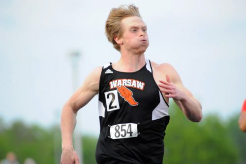 Warsaw's Landan Perry speeds home in the 200 finals.