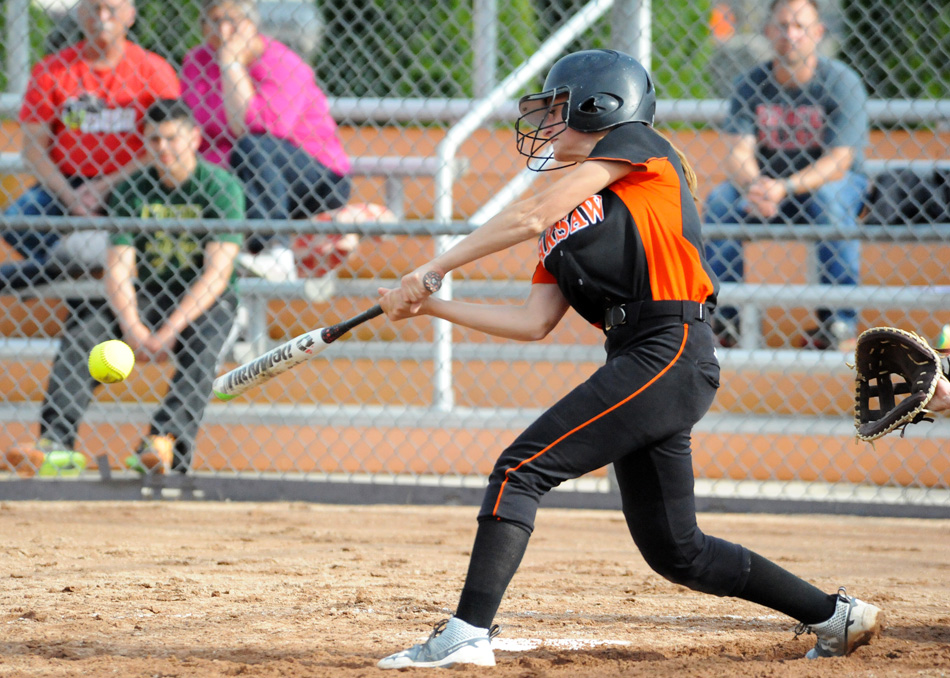 Warsaw's Sarah Shoemaker makes contact Wednesday against NorthWood. (Photo by Mike Deak)