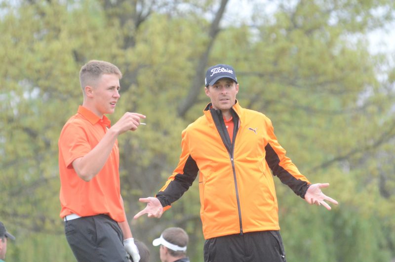 Former Warsaw boys golf coach Ben Barkey was not always serious on the course. Barkey "hams" it up for the camera during a match in 2015 (File photos by Scott Davidson)
