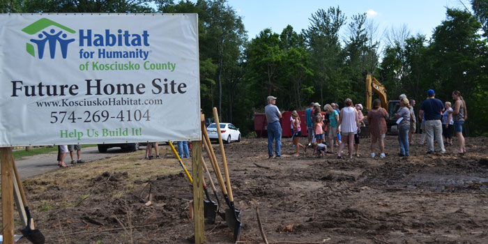 A small crowd gathered Monday afternoon to break ground on two new Habitat for Humanity houses. (Photos by Amanda McFarland)