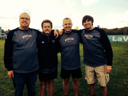 Matt Campbell, far right, poses with Rob Peters, Mills and Greg Davis when all four were coaching with the Warsaw boys cross country program in 2013.