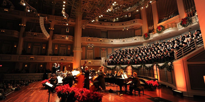 Dr. Michael Davis leading the Indianapolis Chamber Orchestra and Indianapolis Symphonic Choir in song during Festival of Carols on December 21, 2014.