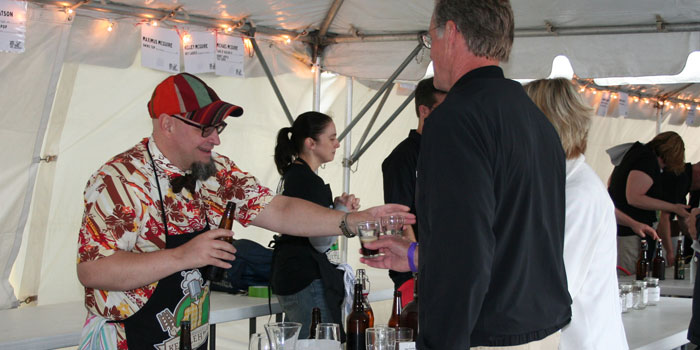 Buckley Watson serves some of his homemade beer during the annual Kettleheads Homebrew Fest. (Photos provided)
