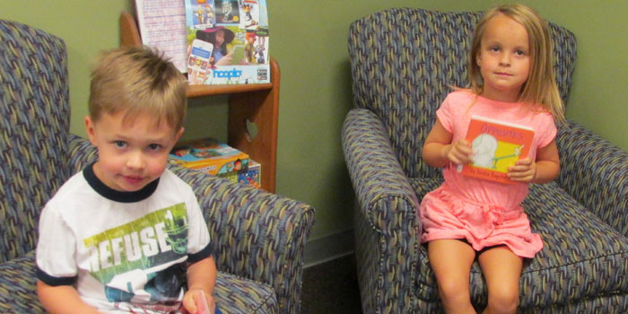 From the left, Brody Maisonneuve and Delaney Tranter visited the North Webster Library with the North Webster Daycare to sign up for the Summer Reading Program.
