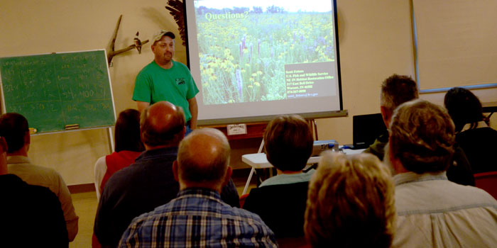 Scott Fetters answers questions following his presentation on pollinators and pollinator habitat.