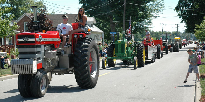 Tractors driving through Main Street in Silver Lake at the Silver Lake Days.