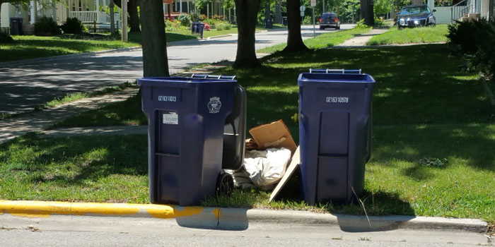Residents have expressed concern over recent changes in Warsaw's trash pickup ordinance. (Photos provided)