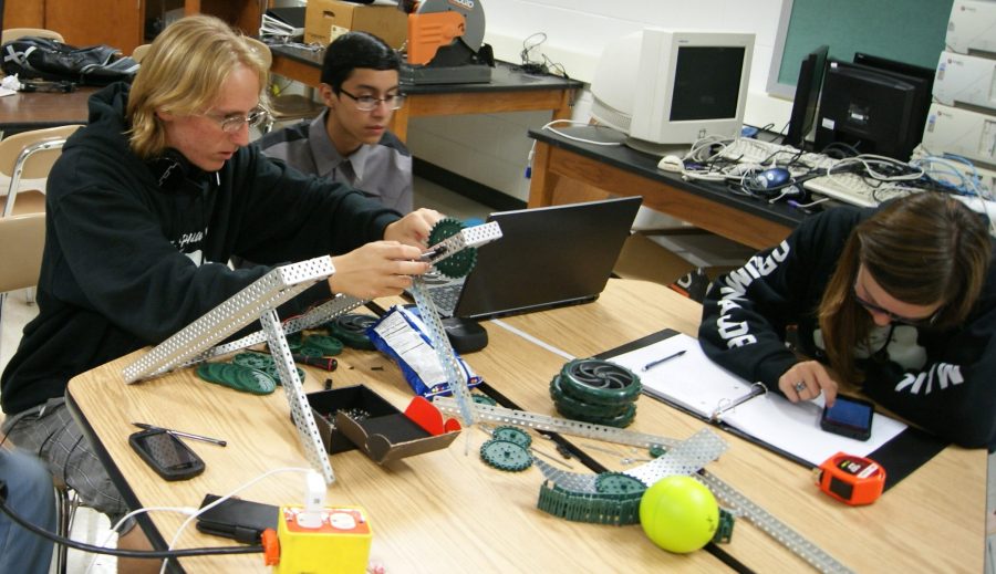 From left, Cedric Church, Abdiel Sanchez and Mandi Mall participated in a summer robotics camp in 2015 at Wawasee High School.