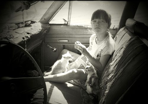 One of Kimble's photographs, "Homeless Girl and Kitten." (Photo Provided)