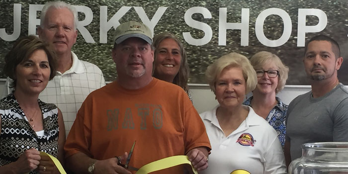 In front, from left, are the North Webster Chamber of Commerce's Brenda Peterson, Jerky Shop’s Tom Bentele, Karilyn Metcalf and Chris Lusso, both of the chamber. Representing the chamber in back are Terry Frederick, Sue Ward and Helen Leinbach. The North Webster location of the Jerky Shop had a ribbon cutting. (Photo by Martha Stoelting)