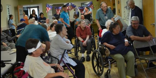 Mayor Joseph Thallemer visiting the residents of Mason Health and Rehabilitation Center during olympic trials. 