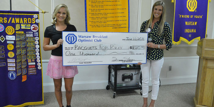 Pictured from left are Camille Kerlin, representing Racquets for Riley, and Jen Kerns, representing the Warsaw Breakfast Optimist Club. (Photo provided)