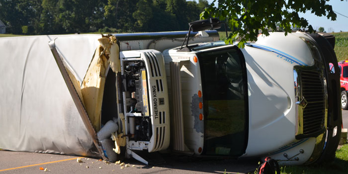 A truck carrying ice rolled over north of Warsaw. (Photos by Amanda McFarland)