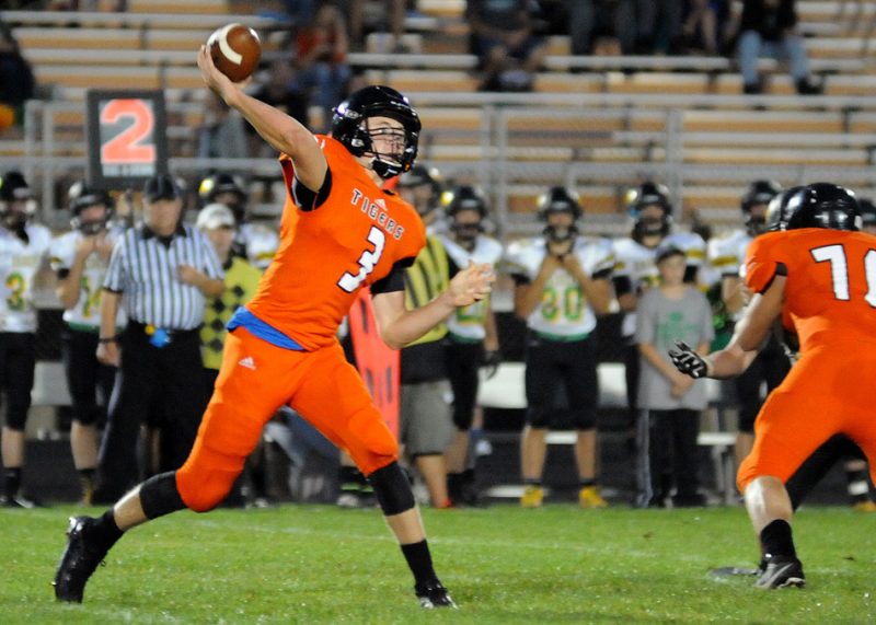 Warsaw senior Michael Jensen is ready to capitalize on his final season under center for the Tigers. (File photo by Mike Deak)
