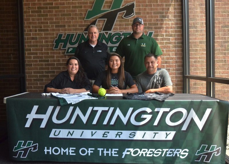 Allissa Flores signed with Huntington University Friday. Pictured, in front from left, are Zulema Flores, Allissa Flores and John Flores. In the back, Huntington coach Doug Gower and former Wawasee softball coach Jared Knipper. (Photo by Nick Goralczyk)