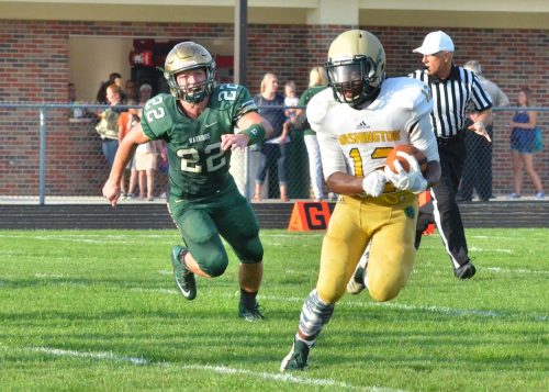 Anthony Coleman (12) gets chased down by Michael Katzer.