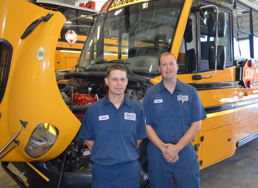 Justin Green, left, and Eric Jackson service a fleet of 63 buses for Wawasee schools in addition to the other school corporation vehicles. The most recent Indiana State Police bus inspection was infraction free for Wawasee.