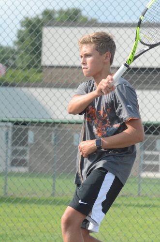 Spencer Britton follows his shot for the Tigers.