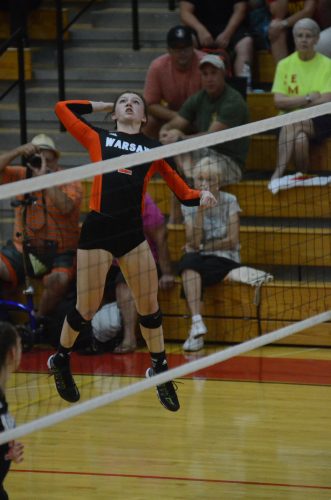 Nikki Parrett shows off her hops at the net for Warsaw.