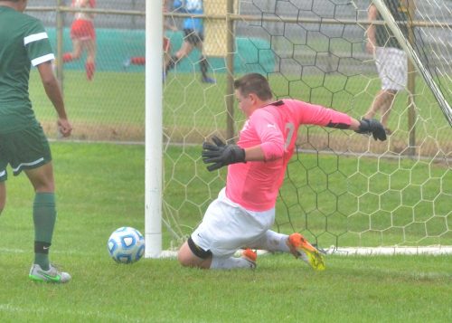 Dillon Drake slides to make this save for Wawasee during Saturday's 3-0 loss to Concord. (Photos by Nick Goralczyk)