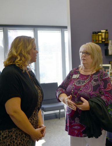From left, Inspire College of Cosmetology Instructor Nikki Lawrence and Warsaw Area Career Center Director Ronna Kawsky discuss different aspects of the program.