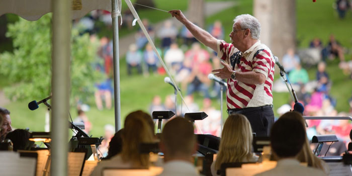 Marty Becker conducts band