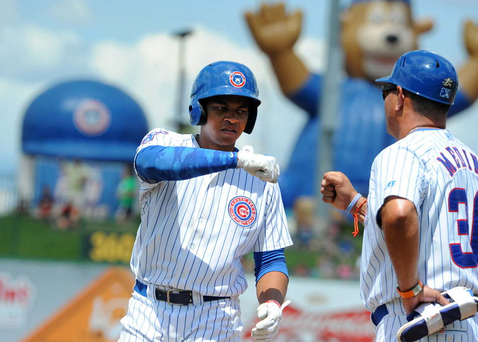South Bend's Adonis Paula celebrates after driving in a run during the Cubs' 5-2 victory over Great Lakes Sunday afternoon at Four Winds Field. (Photos by Mike Deak and Dave Deak)