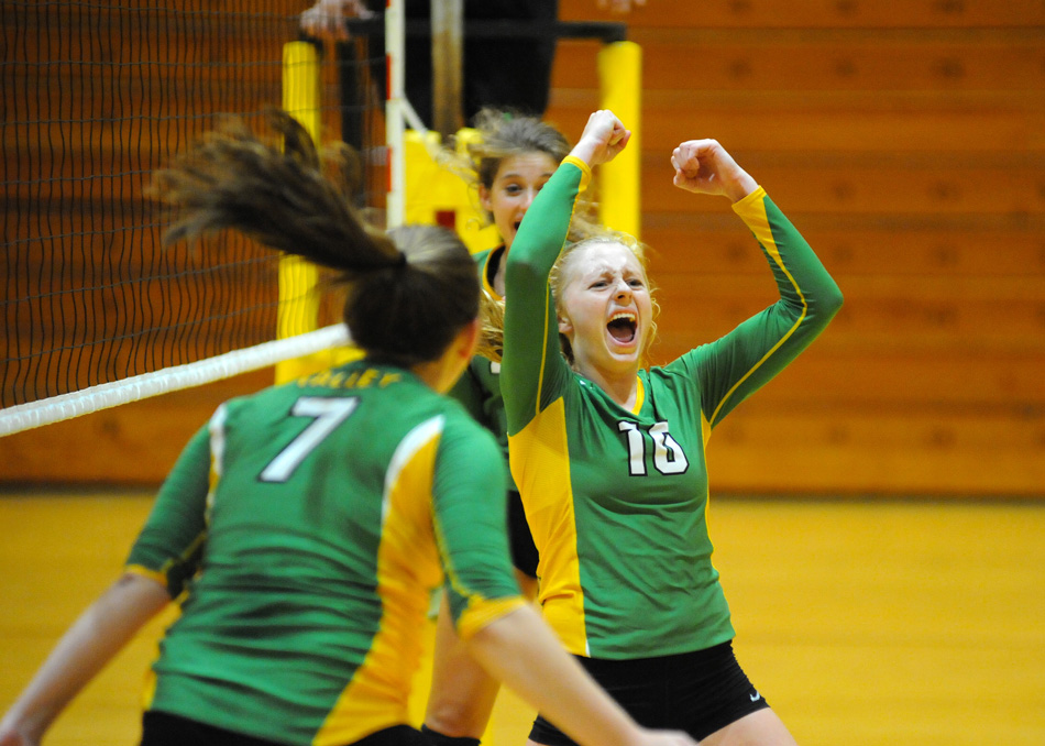 Tippecanoe Valley's Sophie Bussard leads the cheers after her club closed out Marion, 3-0, Monday night. (Photos by Mike Deak)