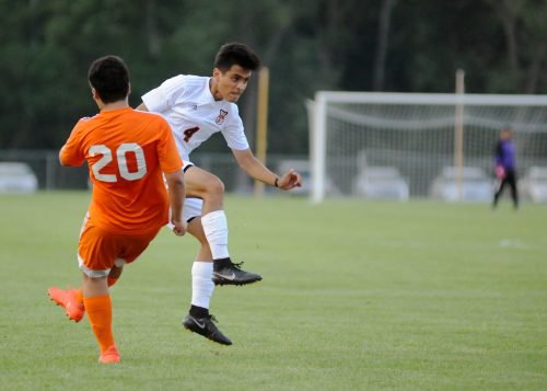 Warsaw's Joaquin Juarez uncorks a shot in the first half.