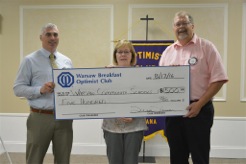The Warsaw Breakfast Optimist Club donated $500 to Warsaw Community Schools. Pictured left to right are David Robertson, representing Warsaw Community Schools, and Jenny Lucht and Randy Polston representing The Warsaw Breakfast Optimist Club.