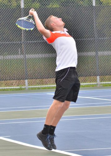 Hayden Steger winds up for his serve during Wednesday's opening rounds. (Photos by Nick Goralczyk)
