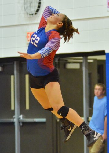 Kaity Reed goes up for a serve during Monday's win over Wawasee. (Photos by Nick Goralczyk)