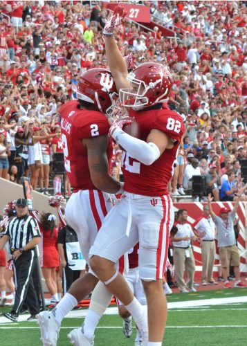 Devonte Williams (left) and Luke Timian (right) celebrate after Timian scored his first-career touchdown.