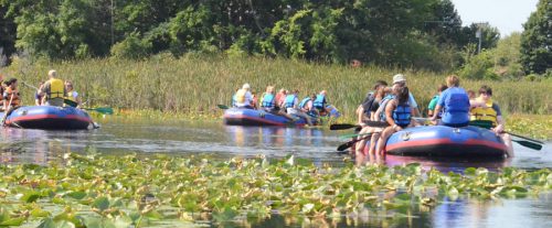 Seven rafts with groups of approximately eight took to the waters of Mudd Lake and Syracuse to learn about the watershed