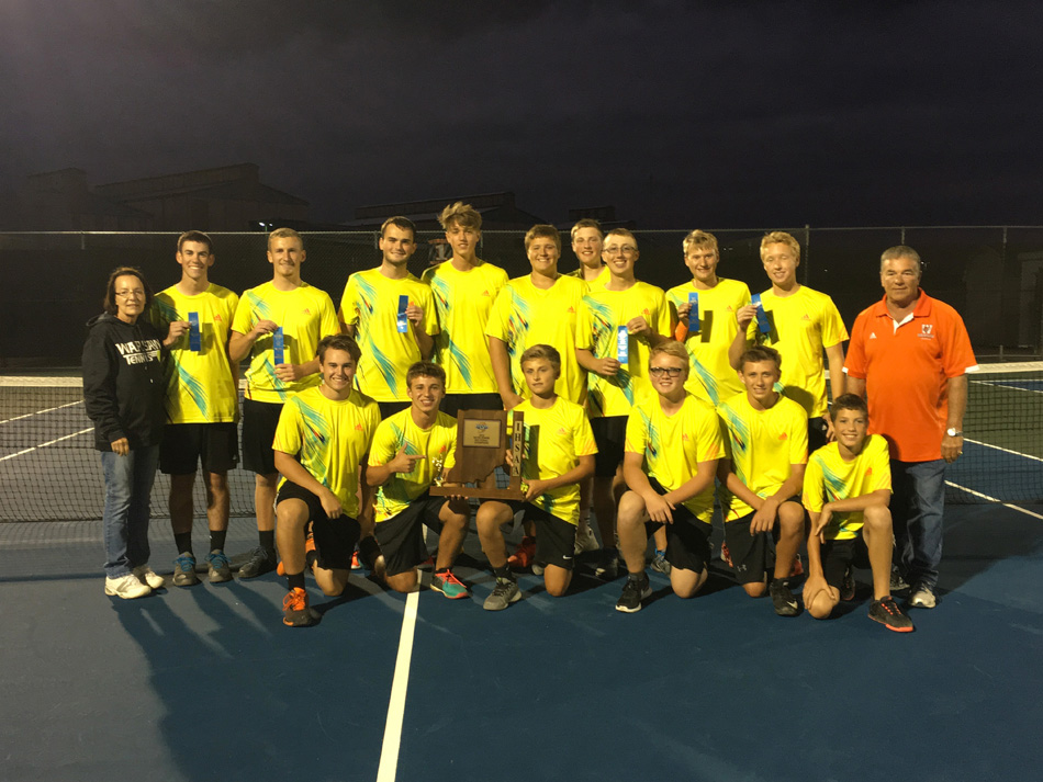 Warsaw poses with its 29th sectional championship trophy after beating Wawasee, 5-0, in the title game Thursday night at the Warsaw Boys Tennis Sectional. (Photos by Mike Deak)