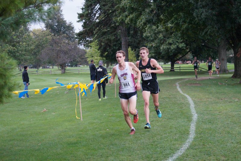 Former WCHS running standout Robert Murphy (at left) took first place honors in the Gold Race at Notre Dame. Murphy led his IUPUI team to a third-place finish.