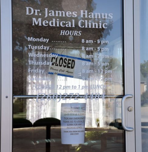 A sign on the office doors states they will reopen at 8 a.m., Wednesday, Oct. 5.