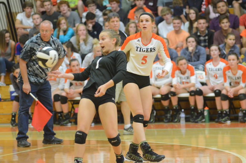 Warsaw's Erin Peugh lets a shot fly long while teammate Cassadi Colbert looks on Tuesday night. No. 5 Penn beat the Tigers 3-0.