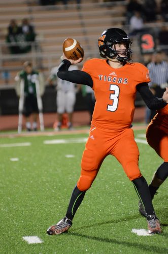 Quarterback Michael Jensen fired four touchdown passes for the Tigers.