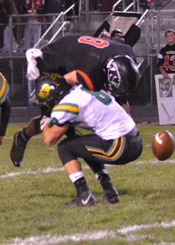 Josh Schlabach (8) breaks up this pass intended for Bronson Yoder. 