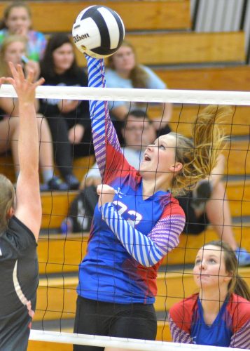 Lyndsey Sapp records a kill during Tuesday night's win over Fremont. (Photos by Nick Goralczyk)