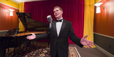 An interpreter sings “It’s De-Lovely” and other familiar tunes in the Cole Porter Room at the Indiana Historical Society. Photo courtesy of Indiana Historical Society.