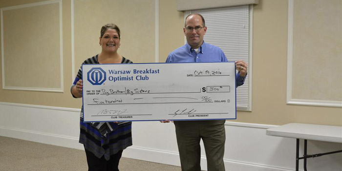 Pictured from left are Shelley Schwab, representing Big Brothers Big Sisters, and Bob Bishop representing The Warsaw Breakfast Optimist Club. 
