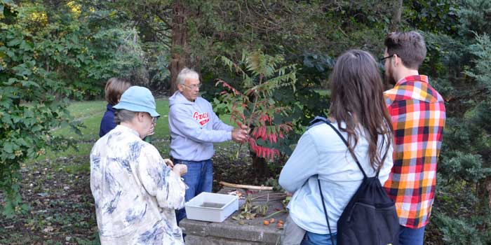 Luke Hunt led the interpretive hike identifying some common plants.