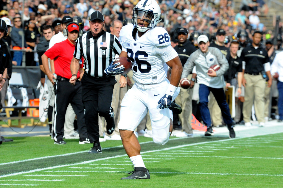 Penn State running back Saquon Barkley ran for XXX yards in a SCORE victory at Purdue Saturday afternoon. (Photos by Mike Deak)