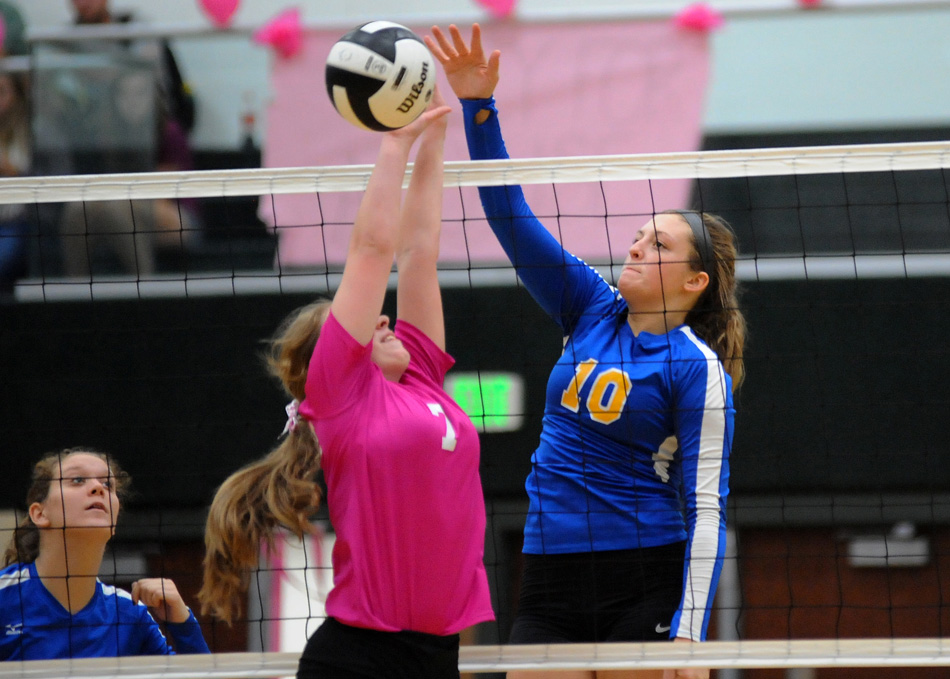 Triton's Nicole Sechrist hammers a point straight down against Wawasee Tuesday night. (Photos by Mike Deak)